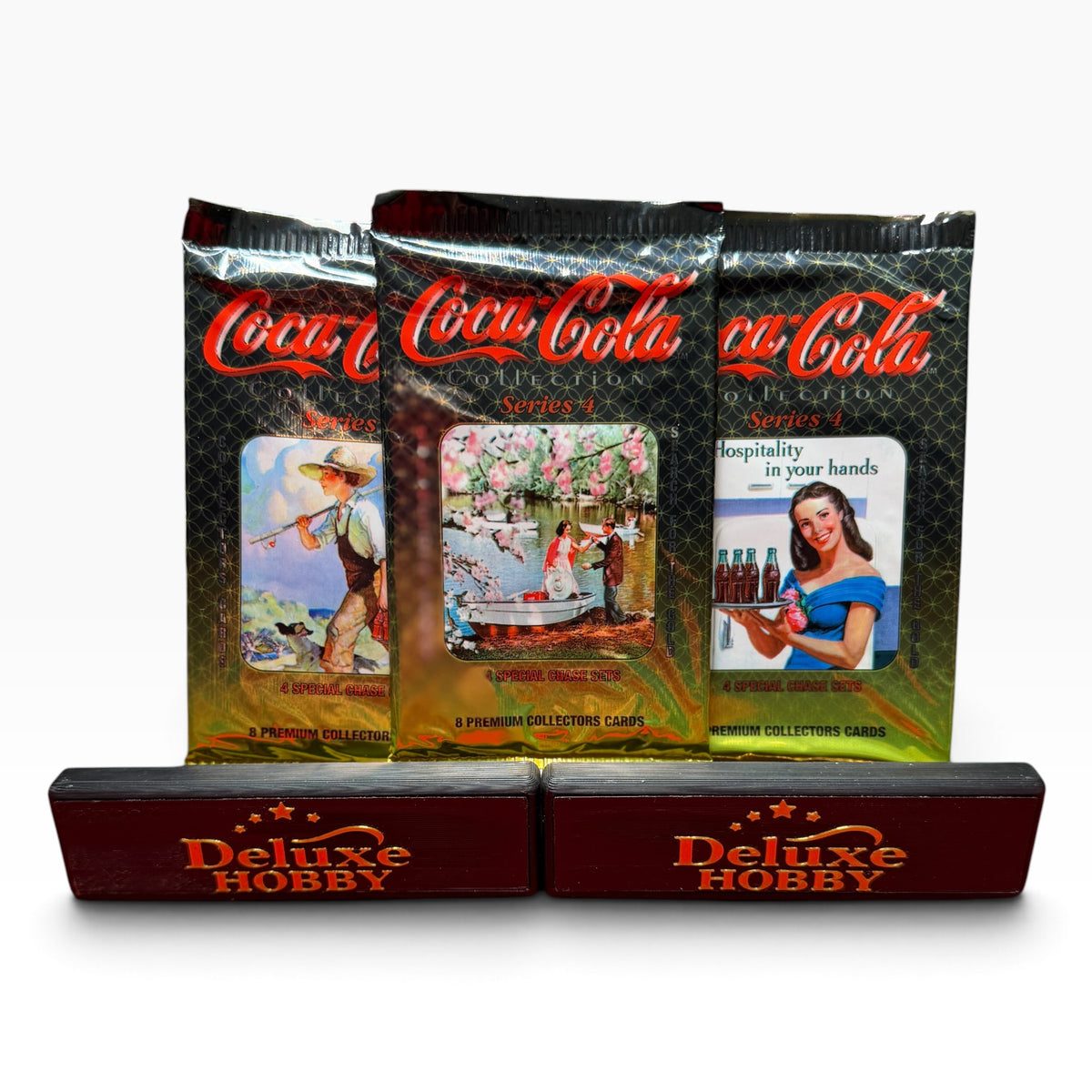 Three sealed Coca-Cola Collection Series 4 trading card packs