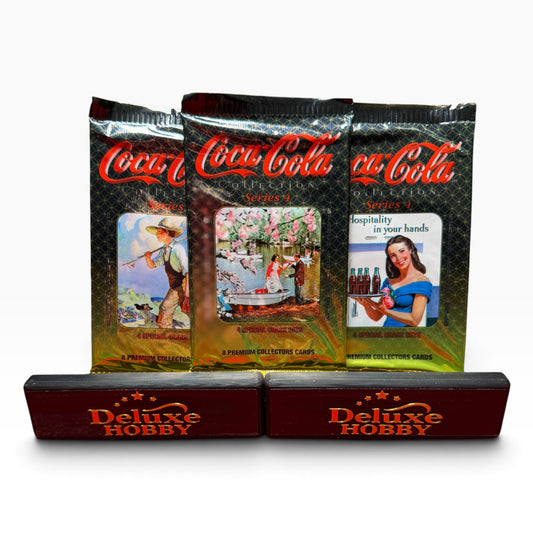 Three sealed Coca-Cola Collection Series 4 trading card packs