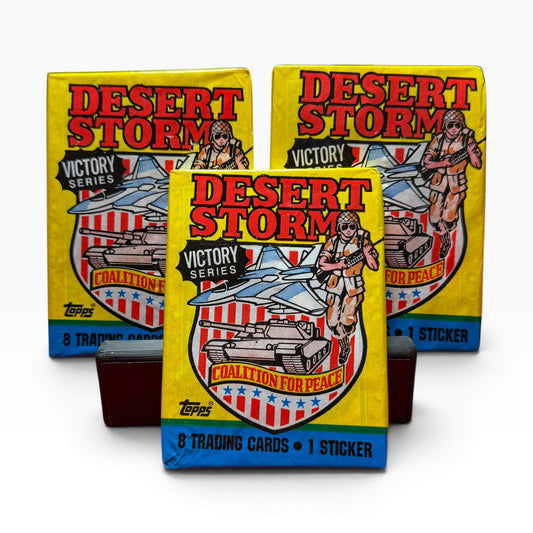 Three sealed 1991 Topps Desert Storm Victory Series trading card packs